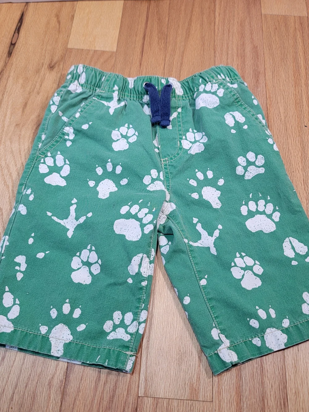 Mini Boden Green Paw-Print Shorts with Navy Drawstring